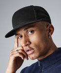 Pitcher snapback